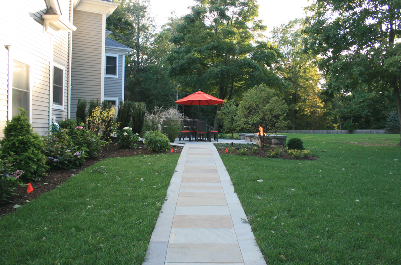 Walkway next to flower beds