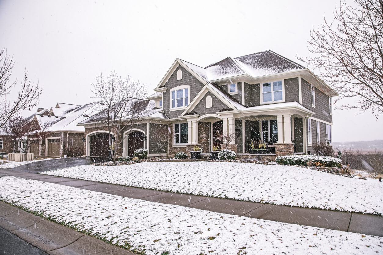 Suburban House with light snow