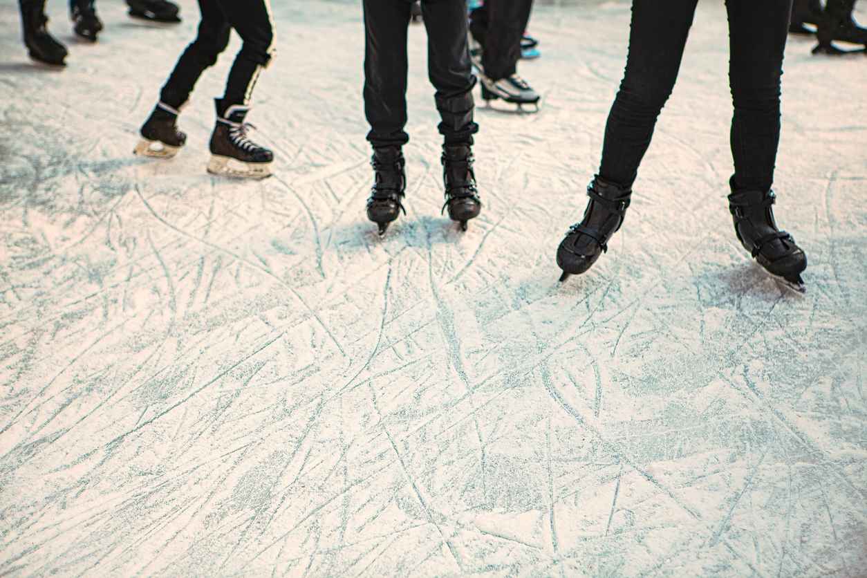 Ice rink with skating people