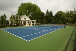 A backyard tennis court built by Ambrosio Landscape Solutions