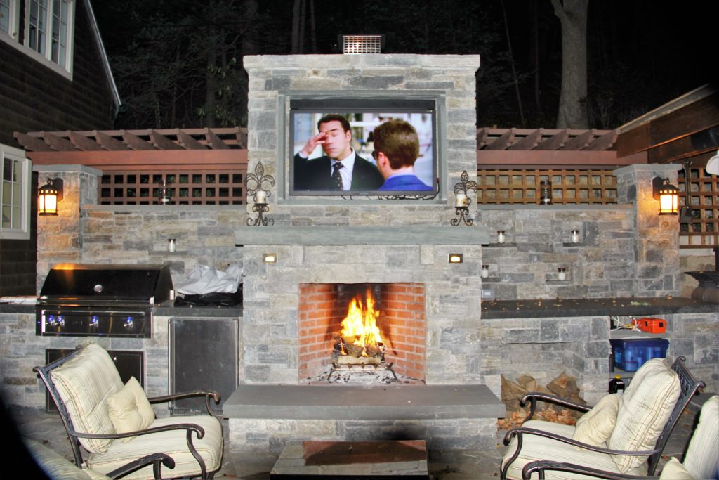Outdoor fireplace and TV